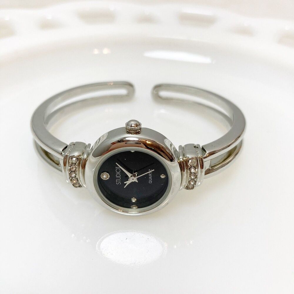 studio time silver tone bangle watch *needs battery